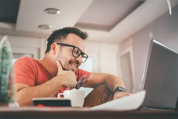 man applying for obamacare online